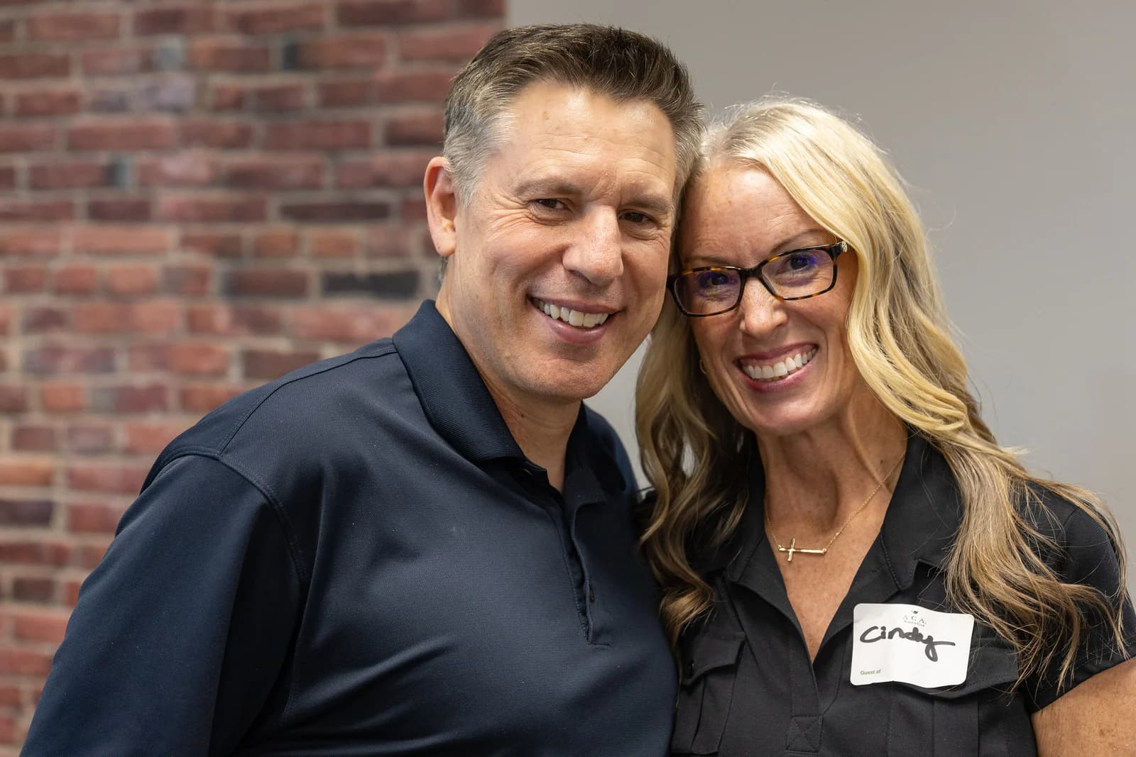 Two guests smiling together at June New Life Networking